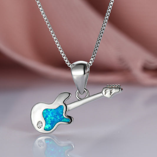 Aier Moxa Blue Opal Guitar Necklace. - PryTheory