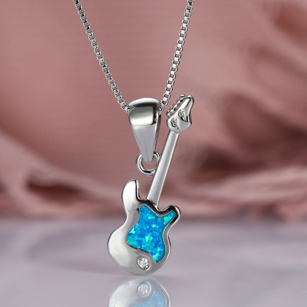 Aier Moxa Blue Opal Guitar Necklace. - PryTheory