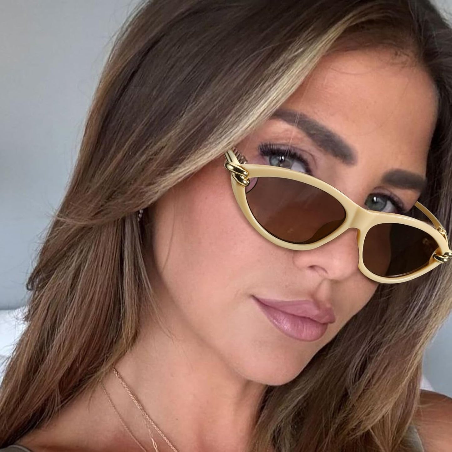 Cat Eye Sunglasses (gold accents).